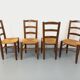 Set of 4 vintage brutalist chairs in wood and straw from the 1960s.