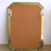 Modernist brass and glass console table & mirror. 1970s