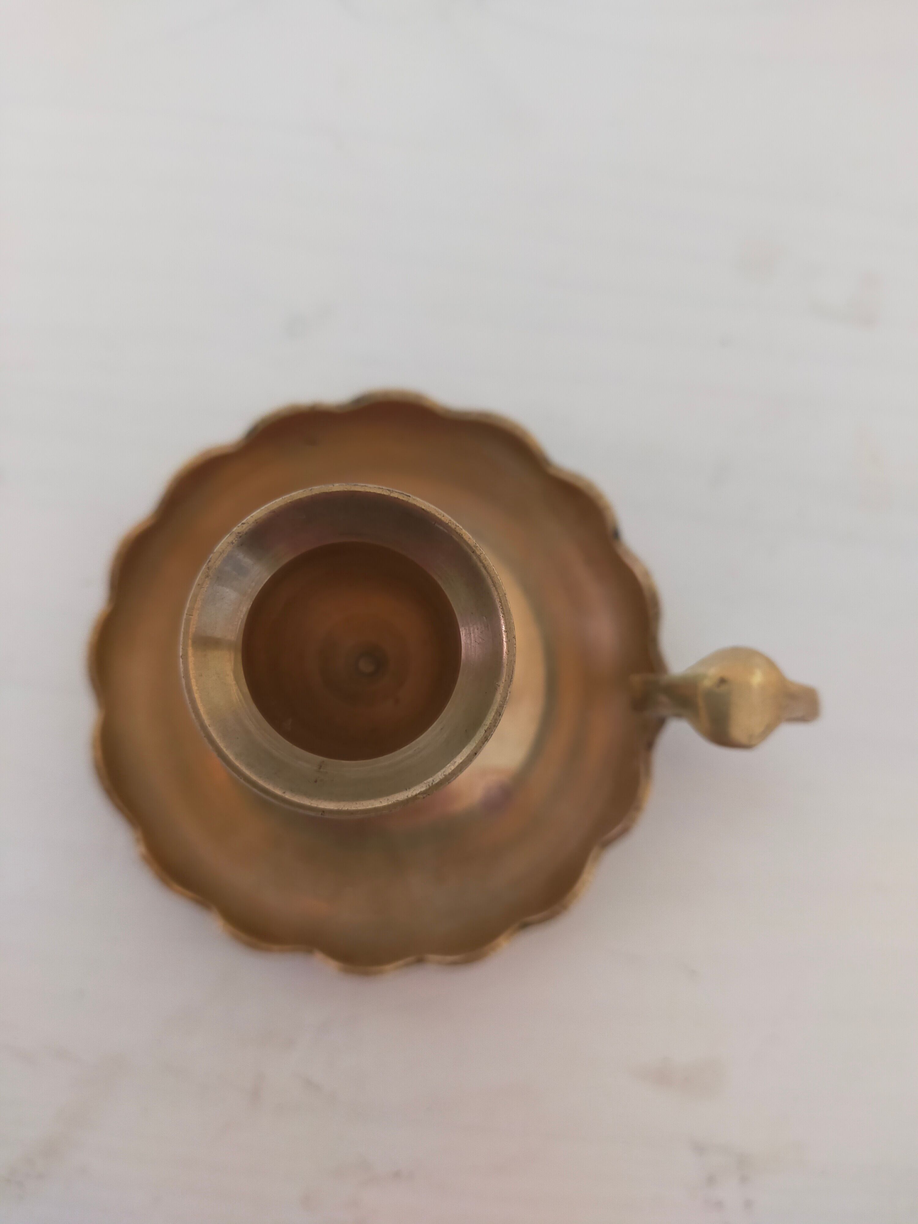 Brass handheld candle holder