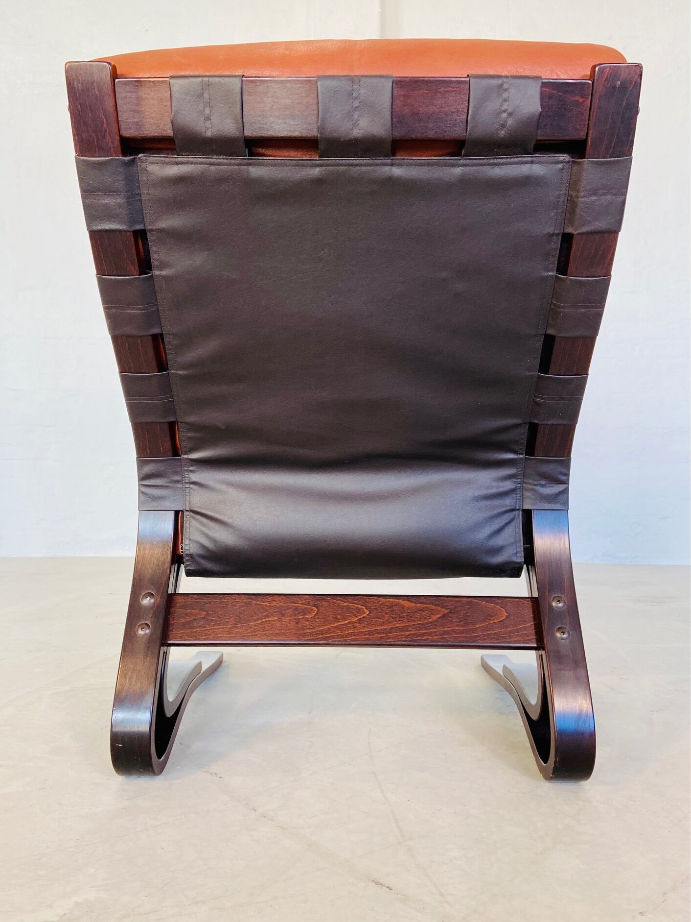 Vintage Scandinavian cognac lounge chair by Oddvin Rykken