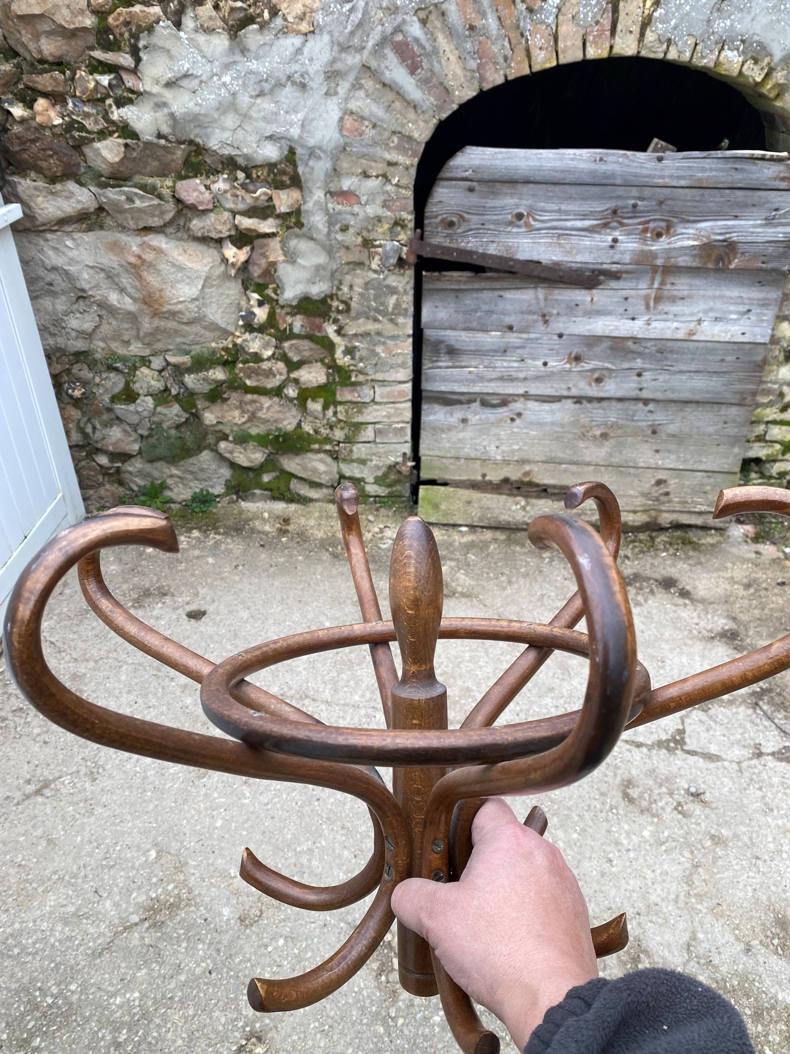 1960s bistro swivel parrot coat rack, curved wood