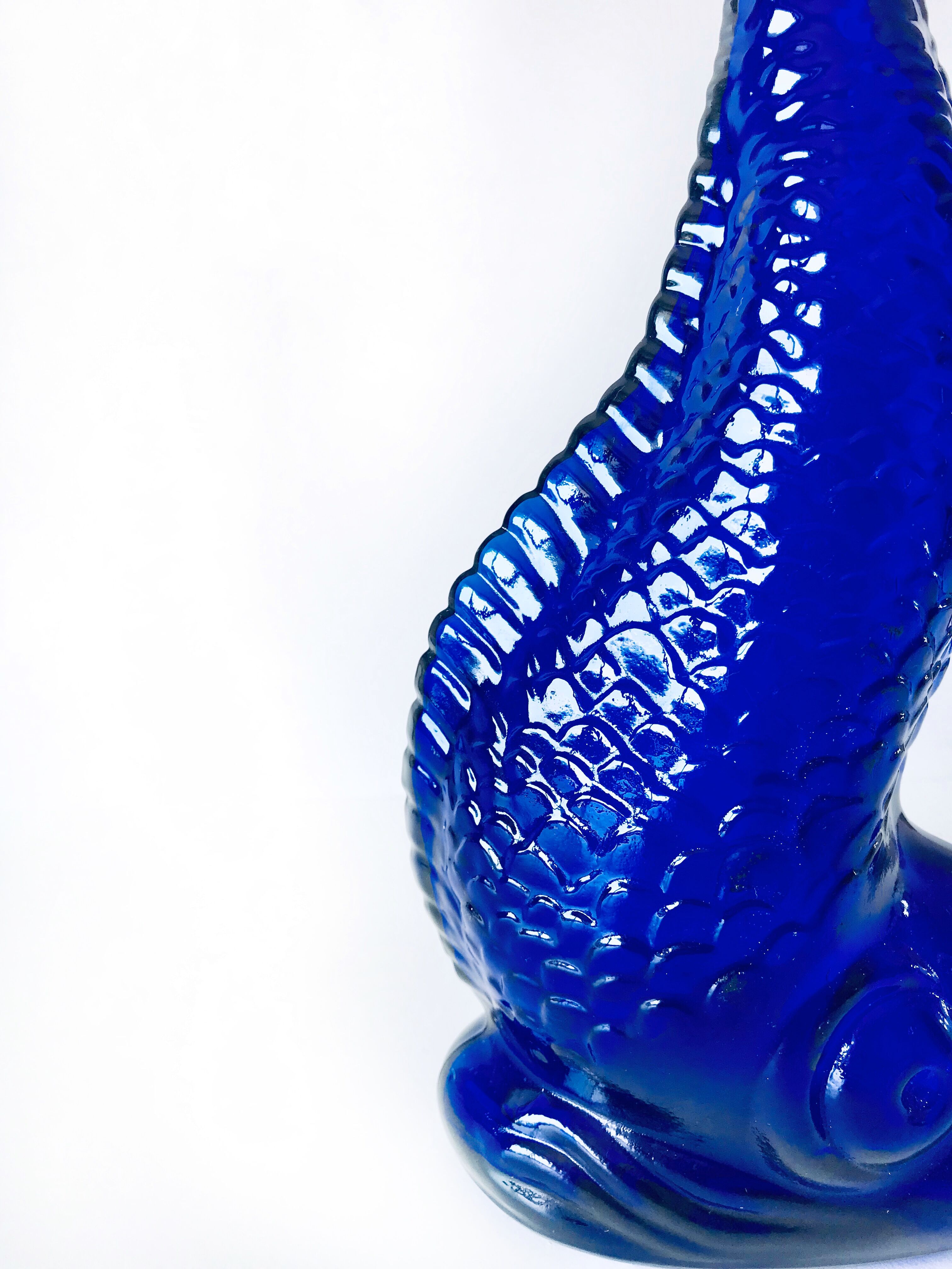 Blue glass fish vase