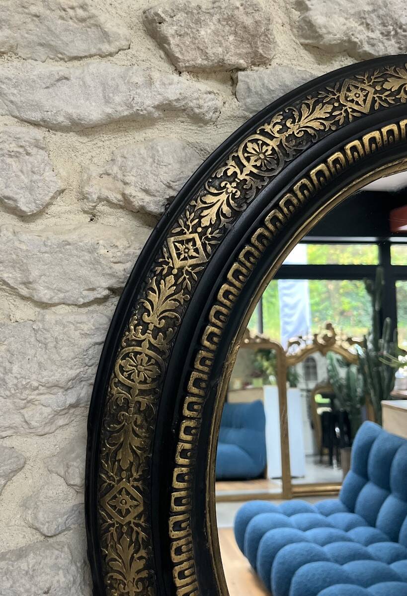 Miroir ancien 61,5/53,5cm ovale époque Napoléon III, noir et doré