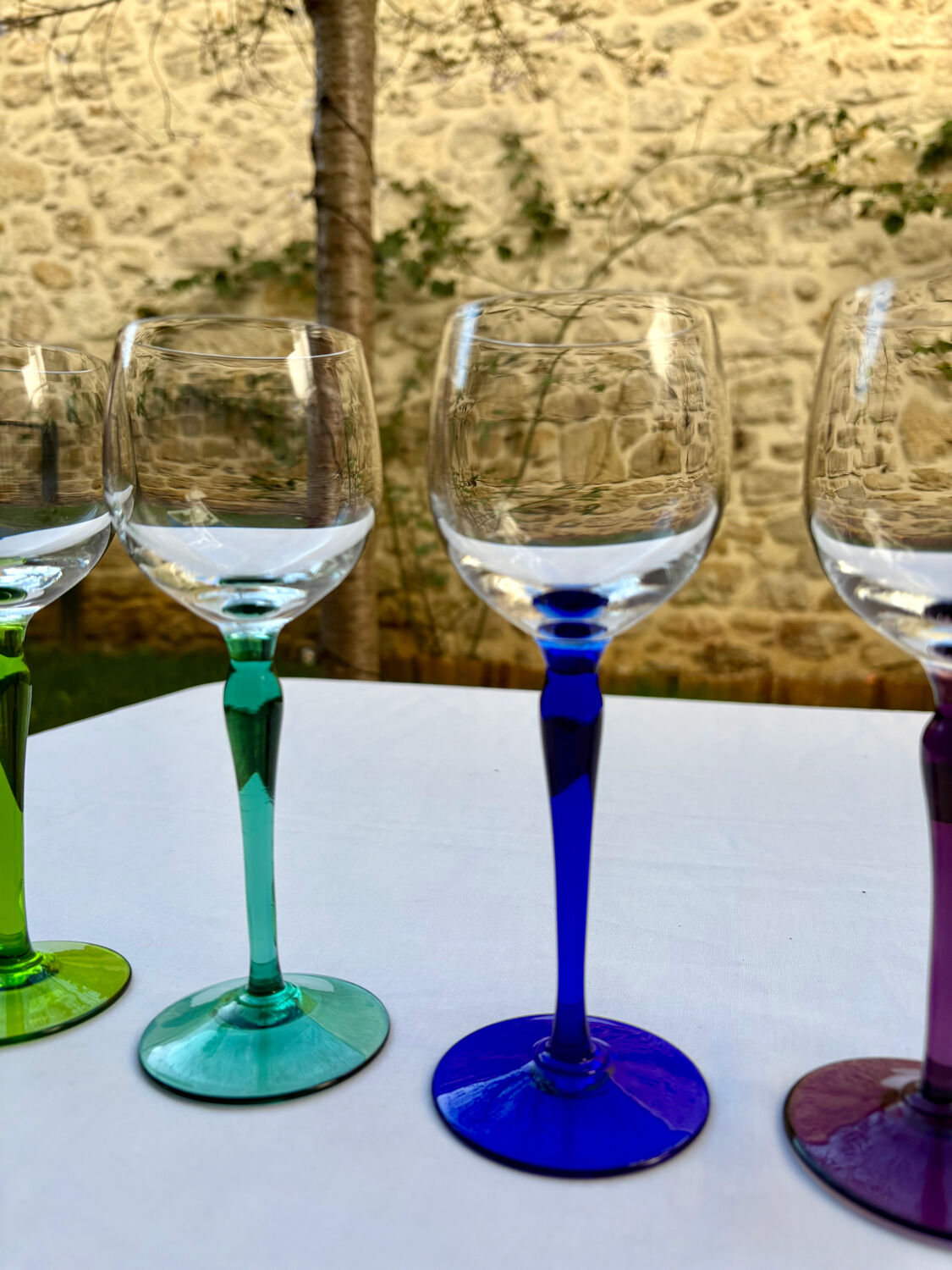 6 crystal glasses with coloured stems