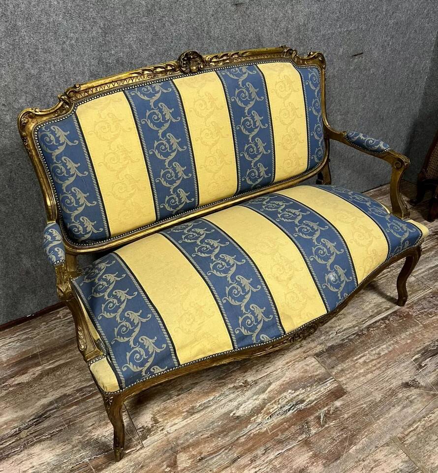 Louis XV style bench in gilded wood, 20th century
