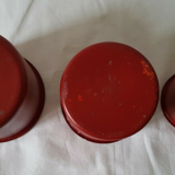 Vintage red metal pots kitchen storage