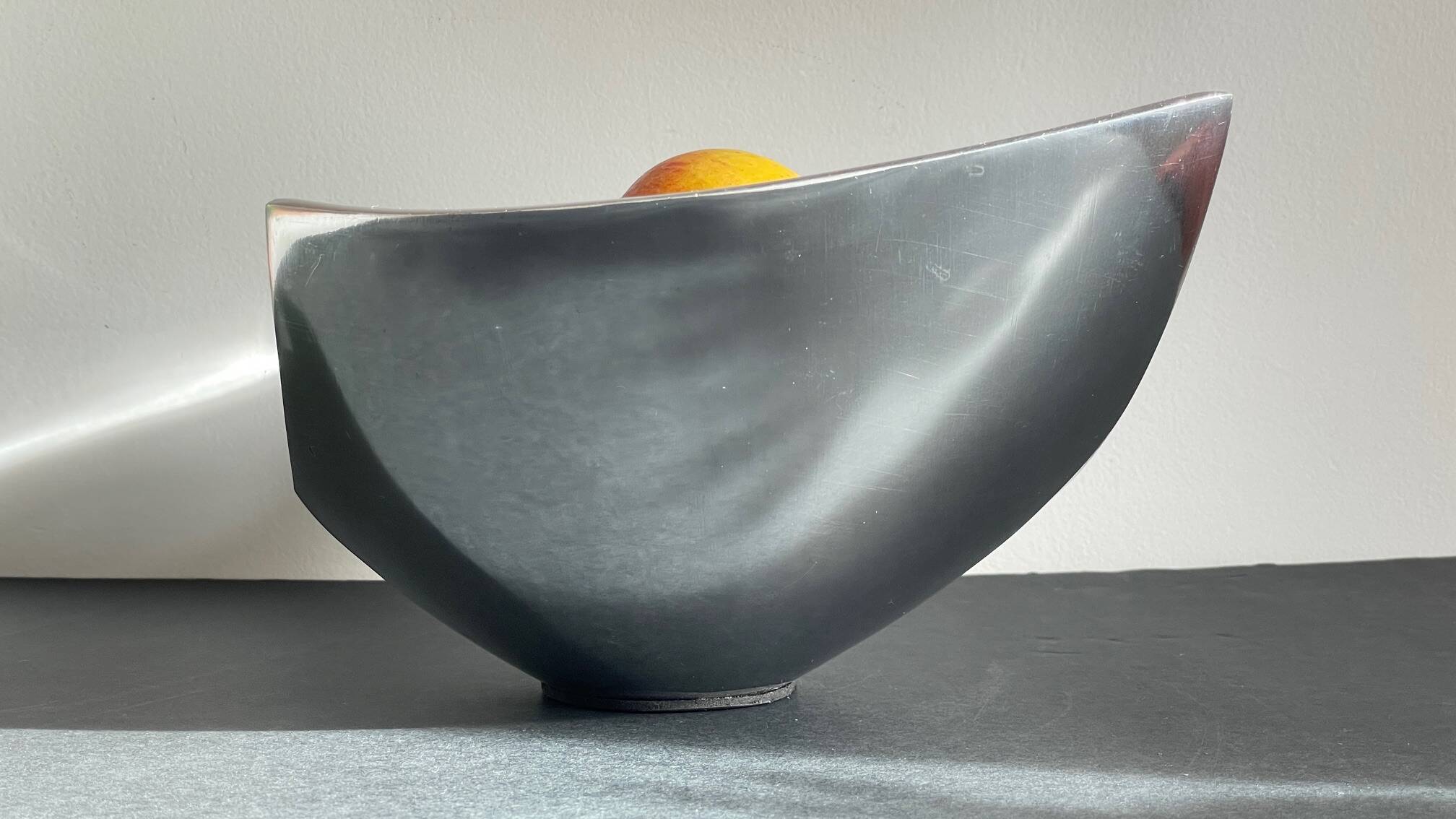 Vintage polished metal fruit bowl