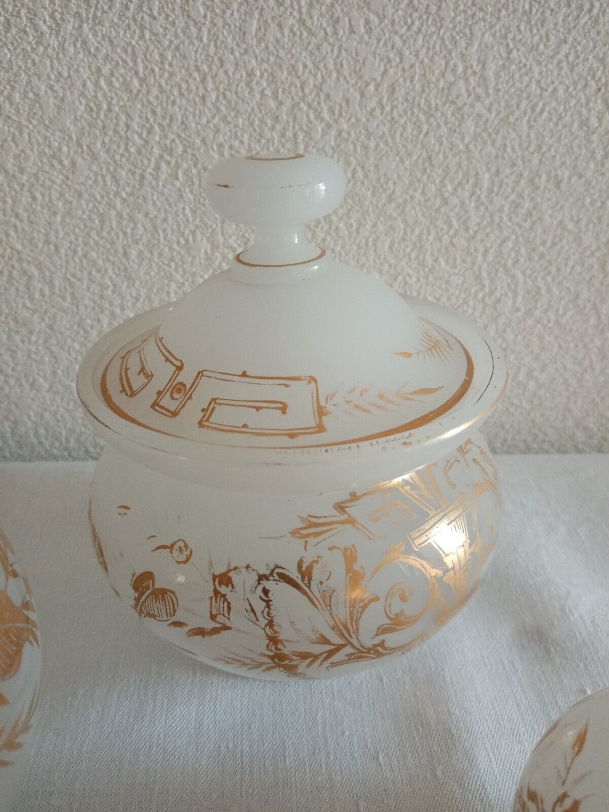 Suite Carafe, Carafon and Pot Opaline with gilded decorations XIX th