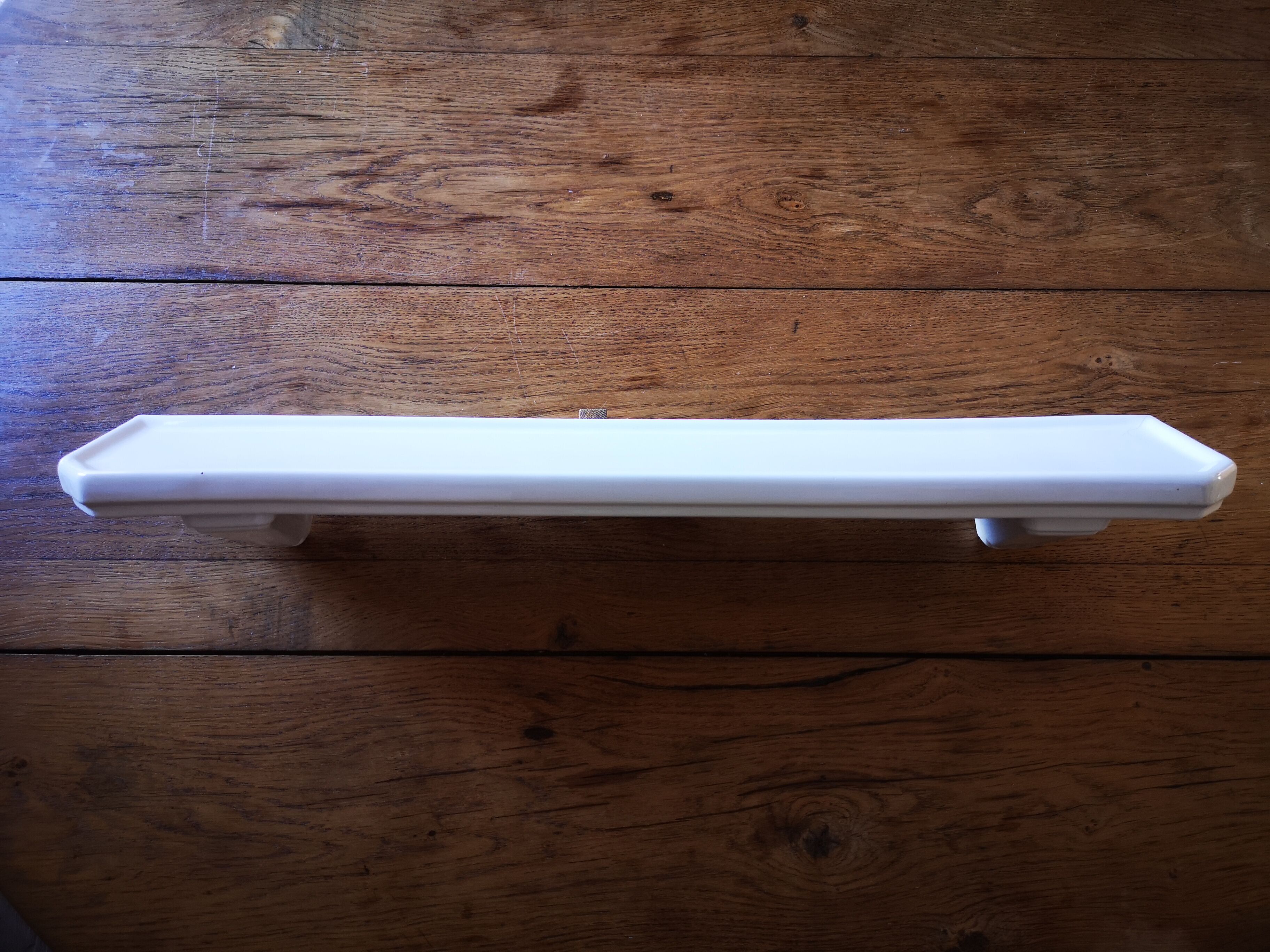 White porcelain wall shelf