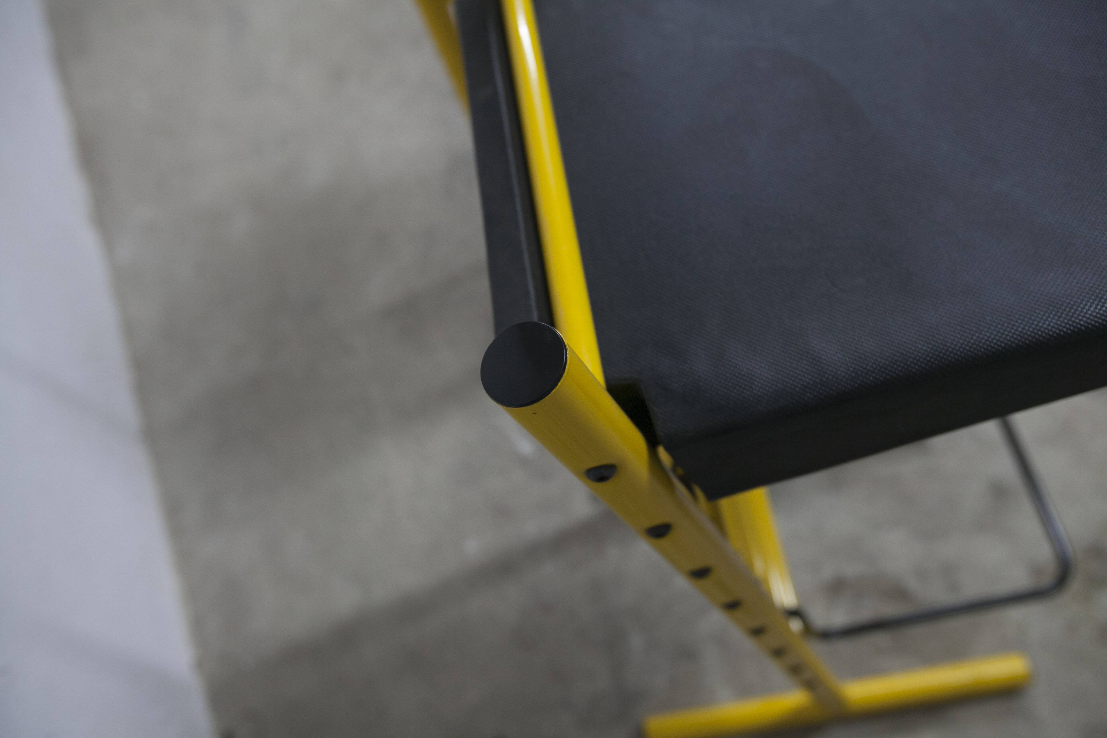 Pair of adjustable Italian bar stools in lacquered yellow and black