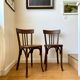 2 chaises bistrot Baumann en bois foncé