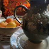 Pitcher decorated with bunches of grapes