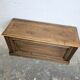 Antique wooden chest with moulded panels
