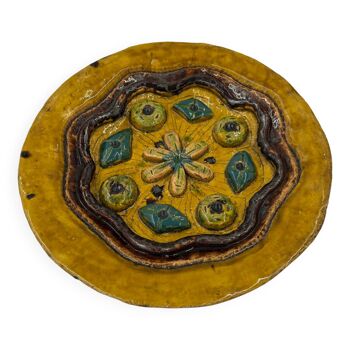 Decorative ceramic plate with relief