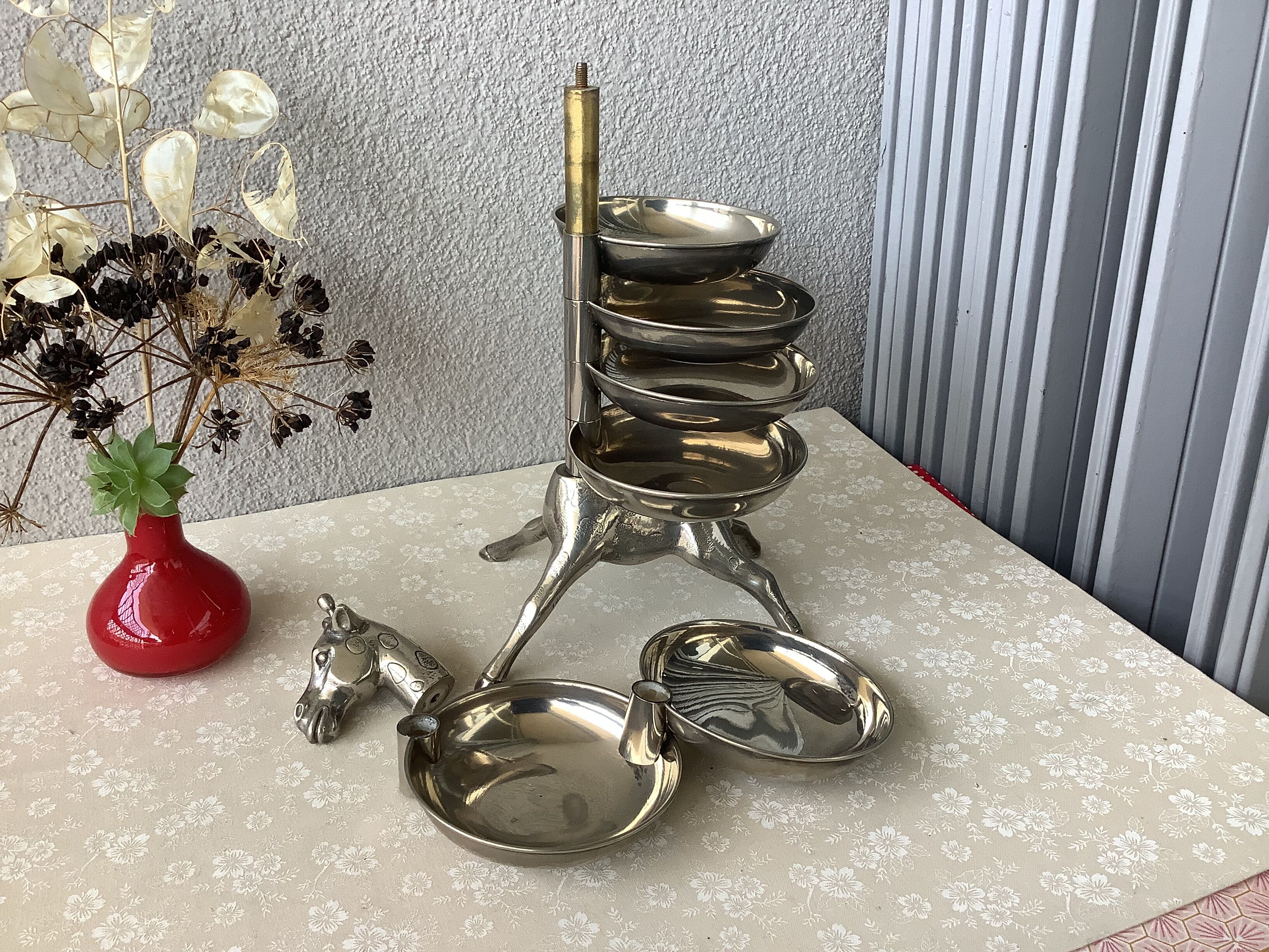 Bronze giraffe and silver metal servant