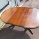 Extendable round table for 4 to 6 people, wood.