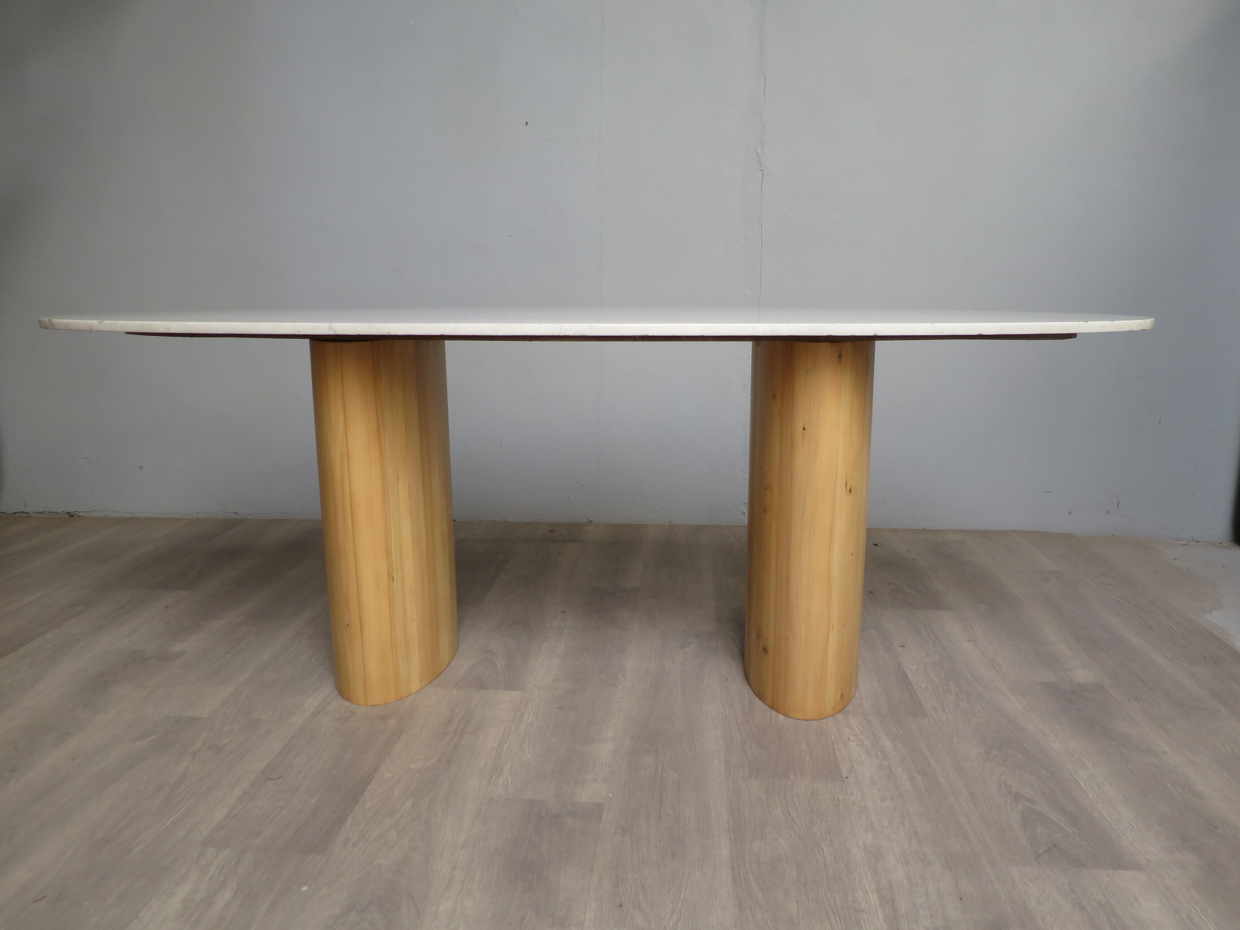 Oval table in Carrara marble and wood