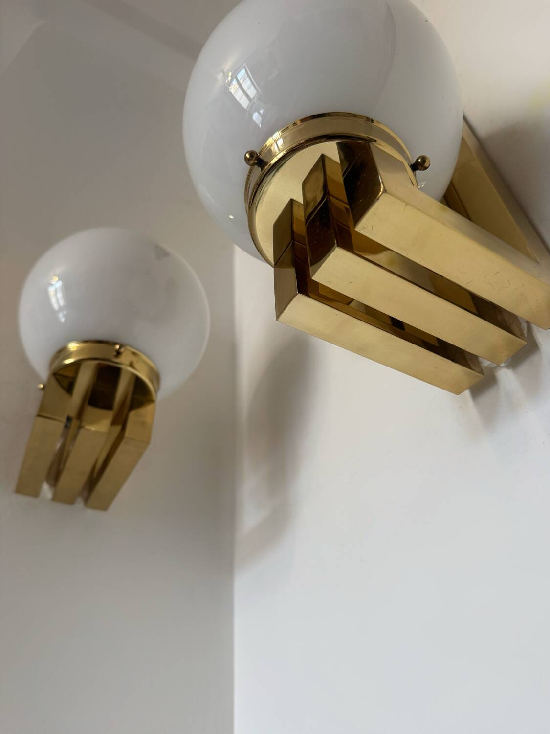 Opaline brass wall lights from the 1970s.