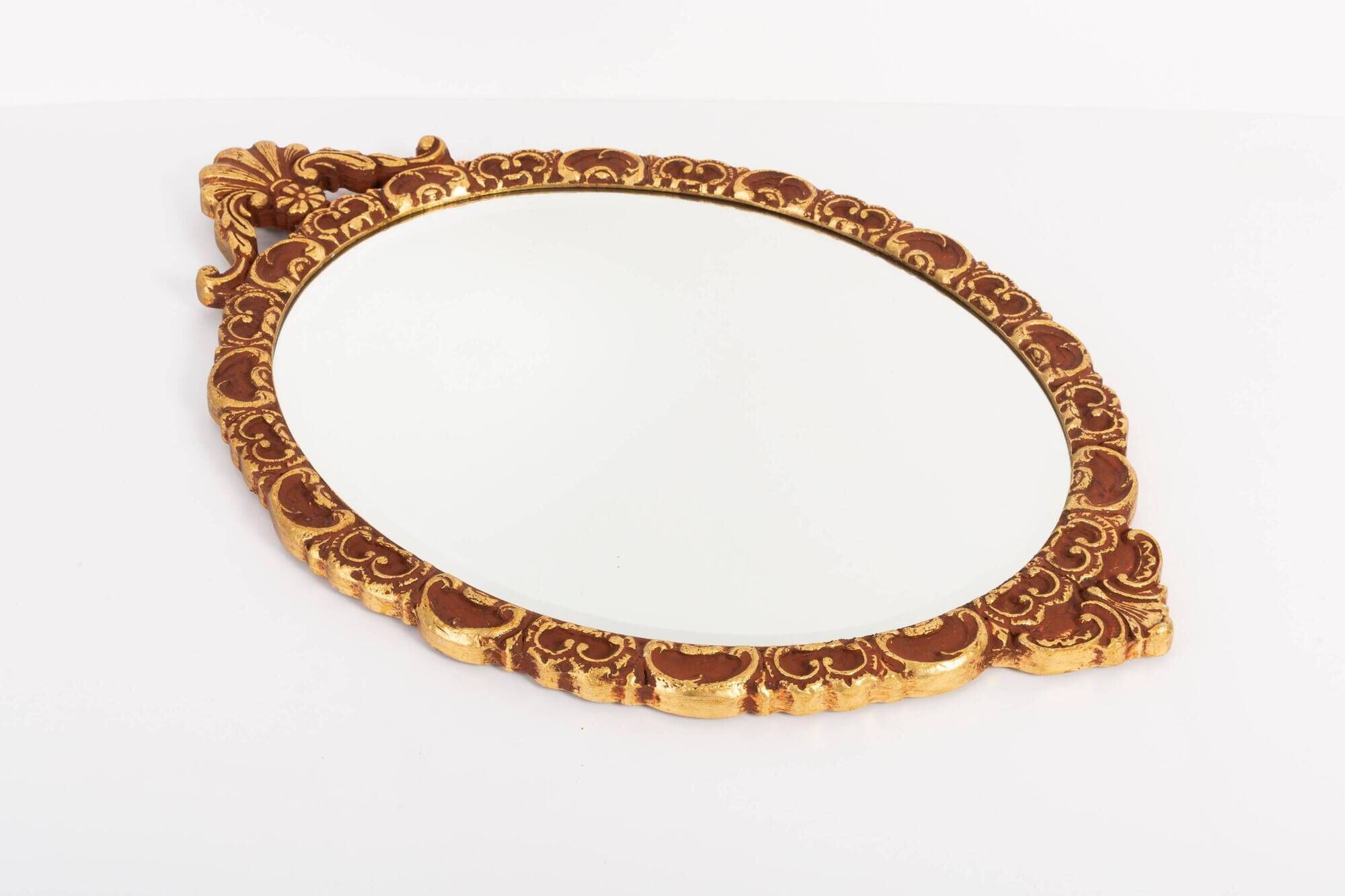 Vintage Italian mirror in gold and brown, gilded woodwork, 1960s.