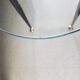 Table basse 1950 ovale en verre acier et laiton