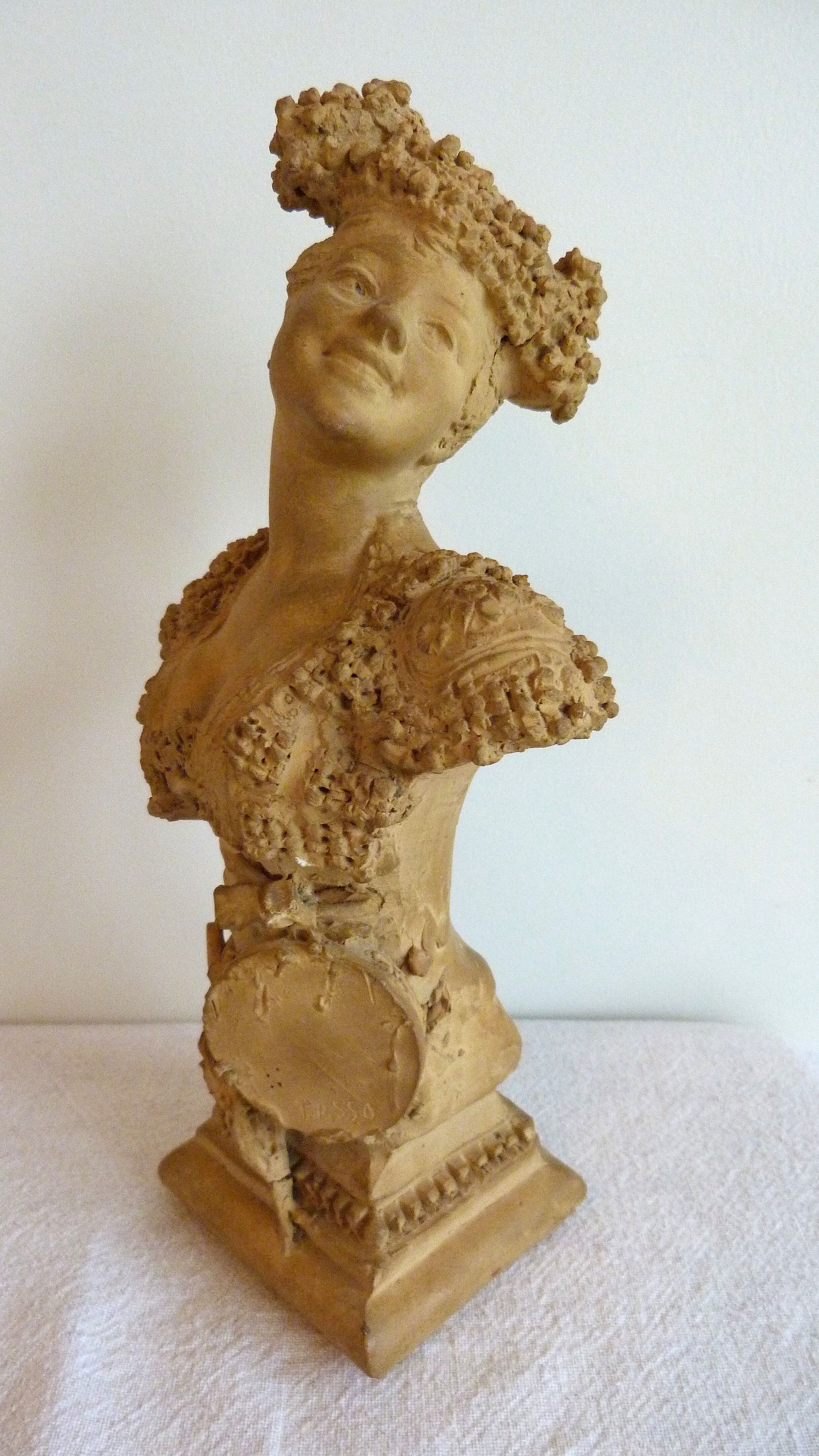 Terracotta bust of a woman signed Torcuato Tasso Y Nadal