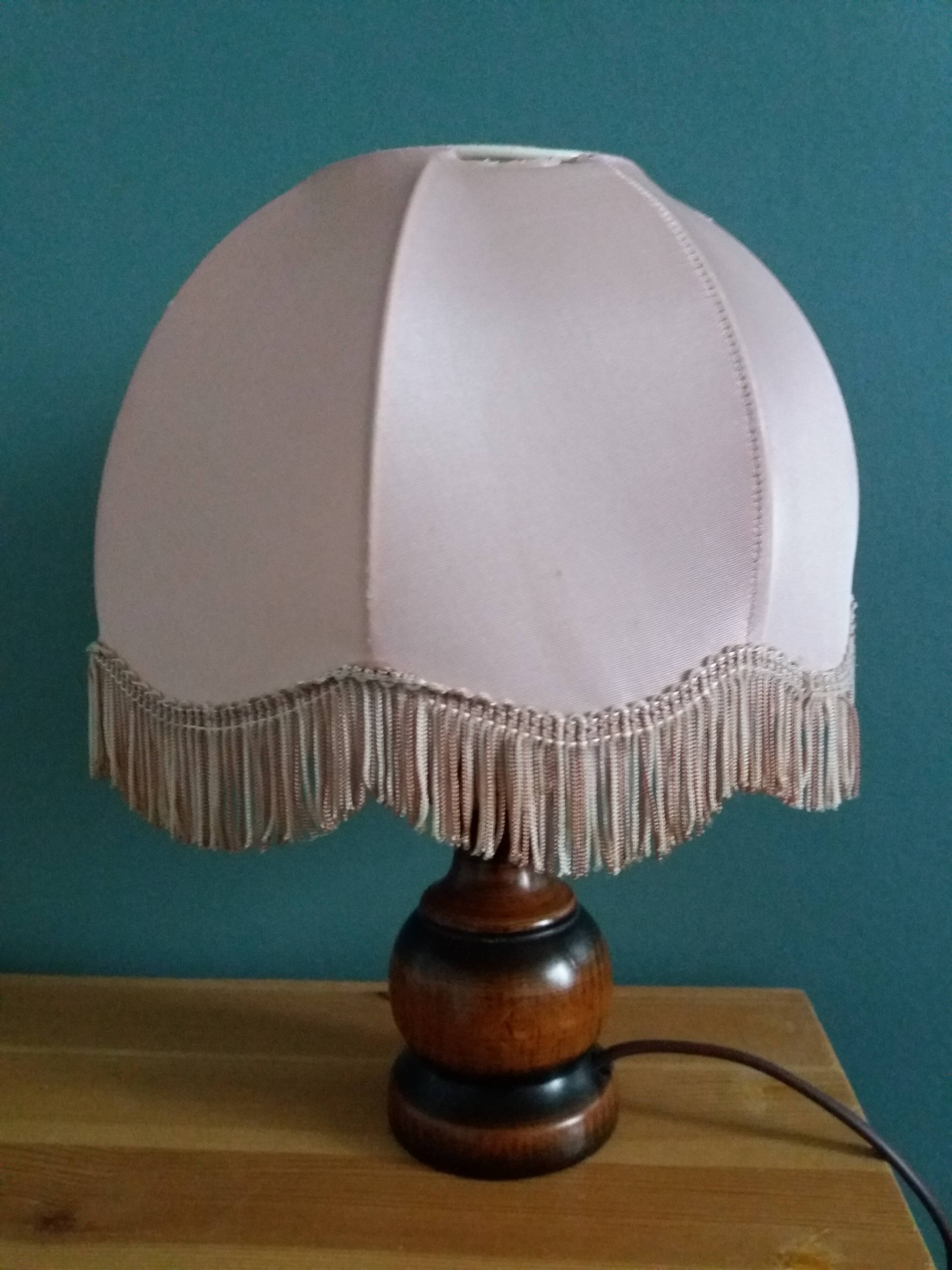 Turned wood bedside lamp with fabric lampshade