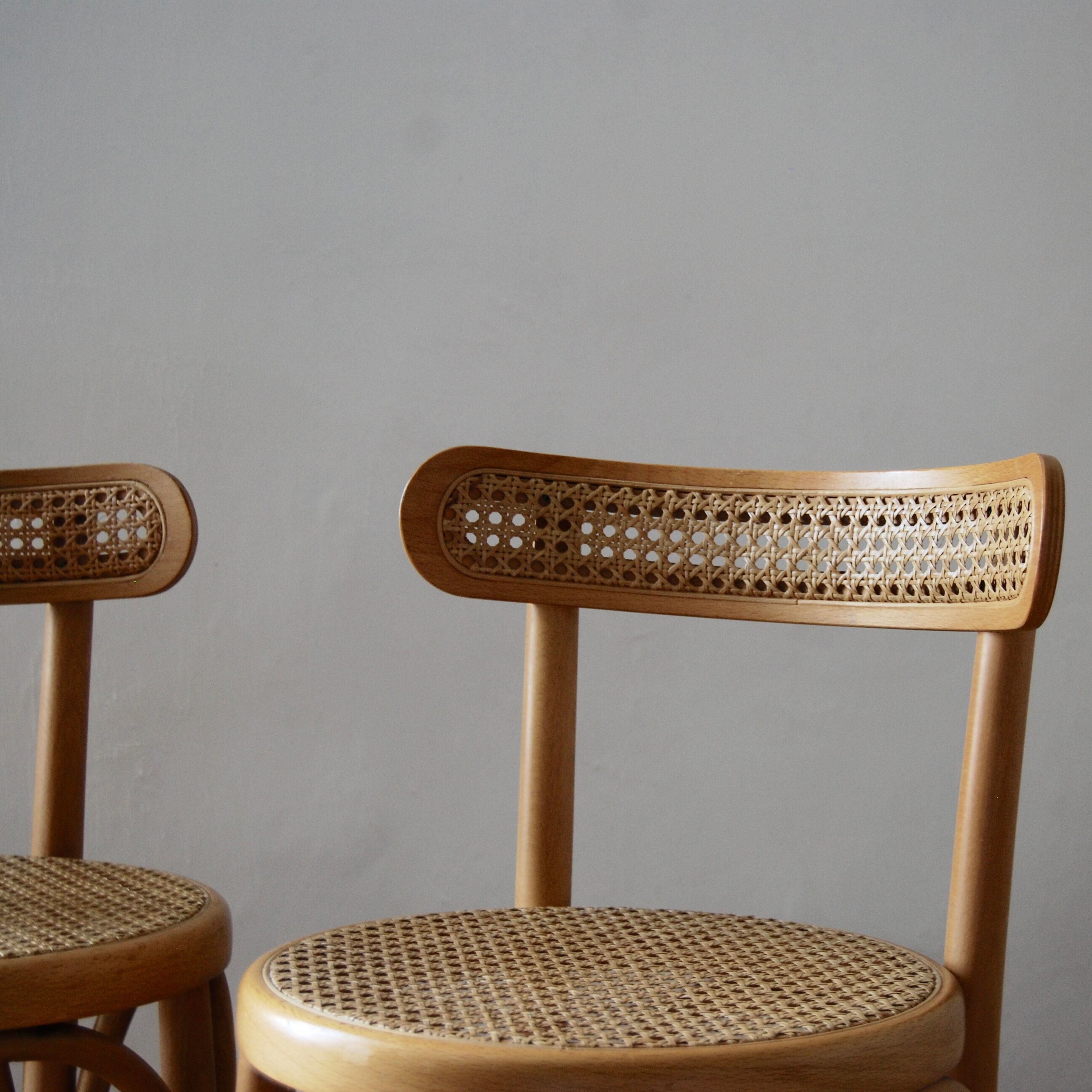 Wooden bar stools and cane