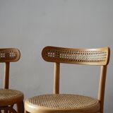 Wooden bar stools and cane