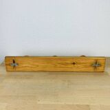 Wall coat rack with pine ball hook