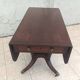 19th-century English style mahogany drop-leaf table.
