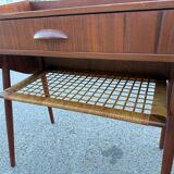 Modernist Danish teak bedside tables with rattan shelves, set of 2