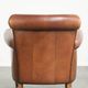 Timeless armchair made of sheepskin leather with a English look