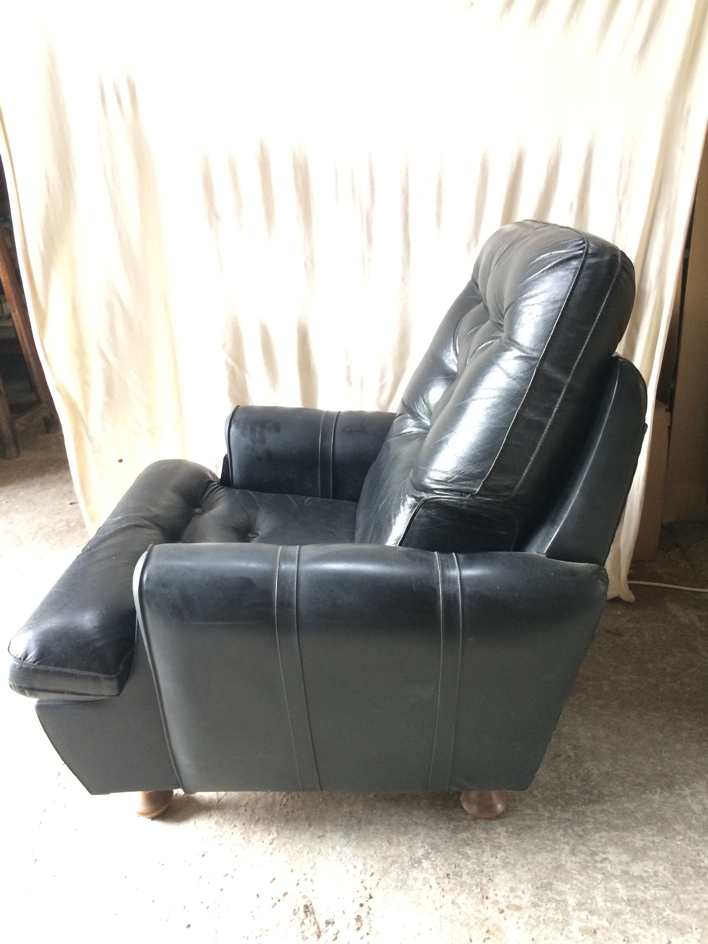 Former black leather chair