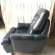 Former black leather chair