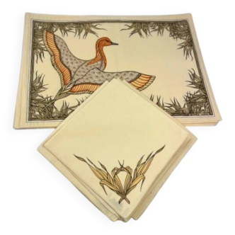 Hermès – Élégante suite de 6 sets de table et 6 serviettes assorties – Motif canard – 100% coton