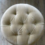 Ottoman in almond green padded velvet of the 1970s