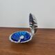 Silver-plated metal shell butter dish with blue insert, 1970