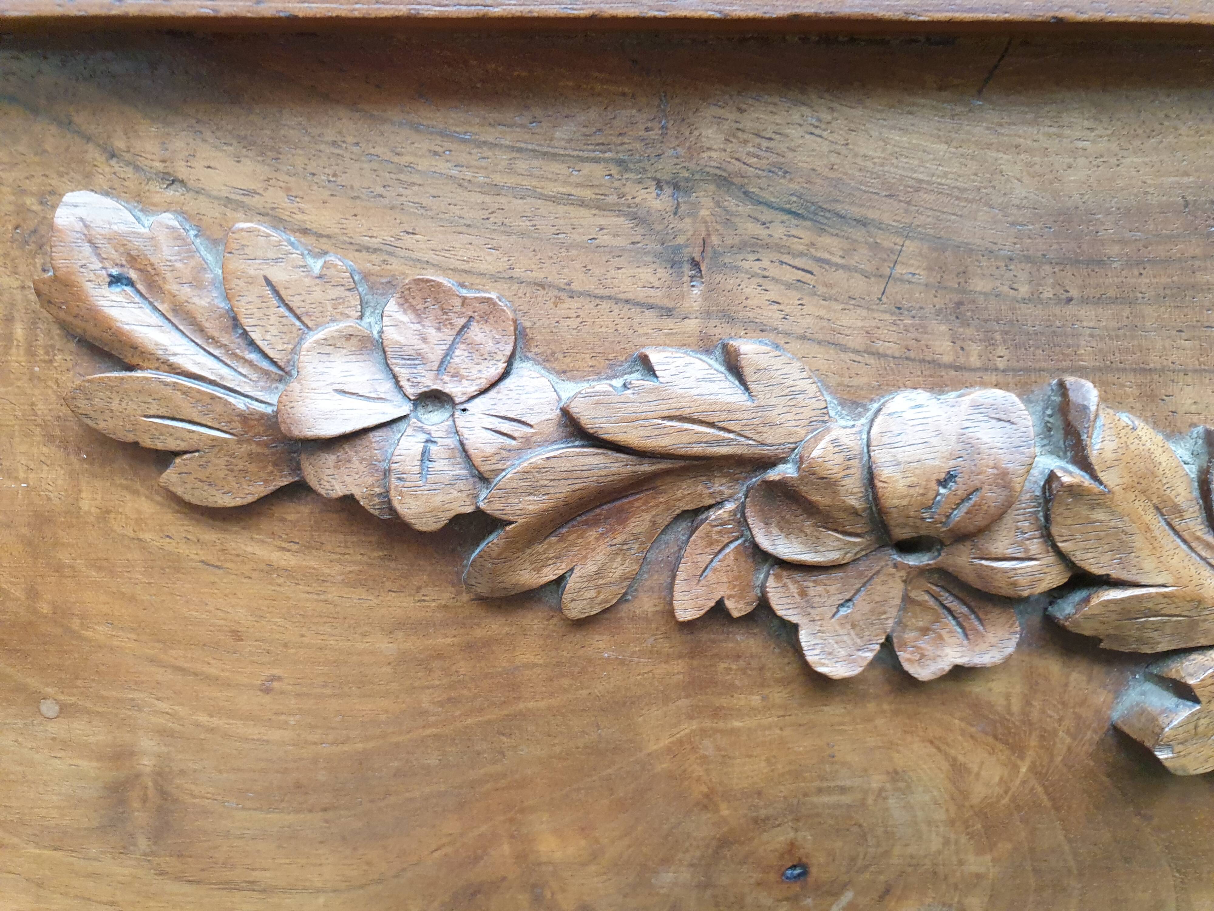 Carved walnut headboard
