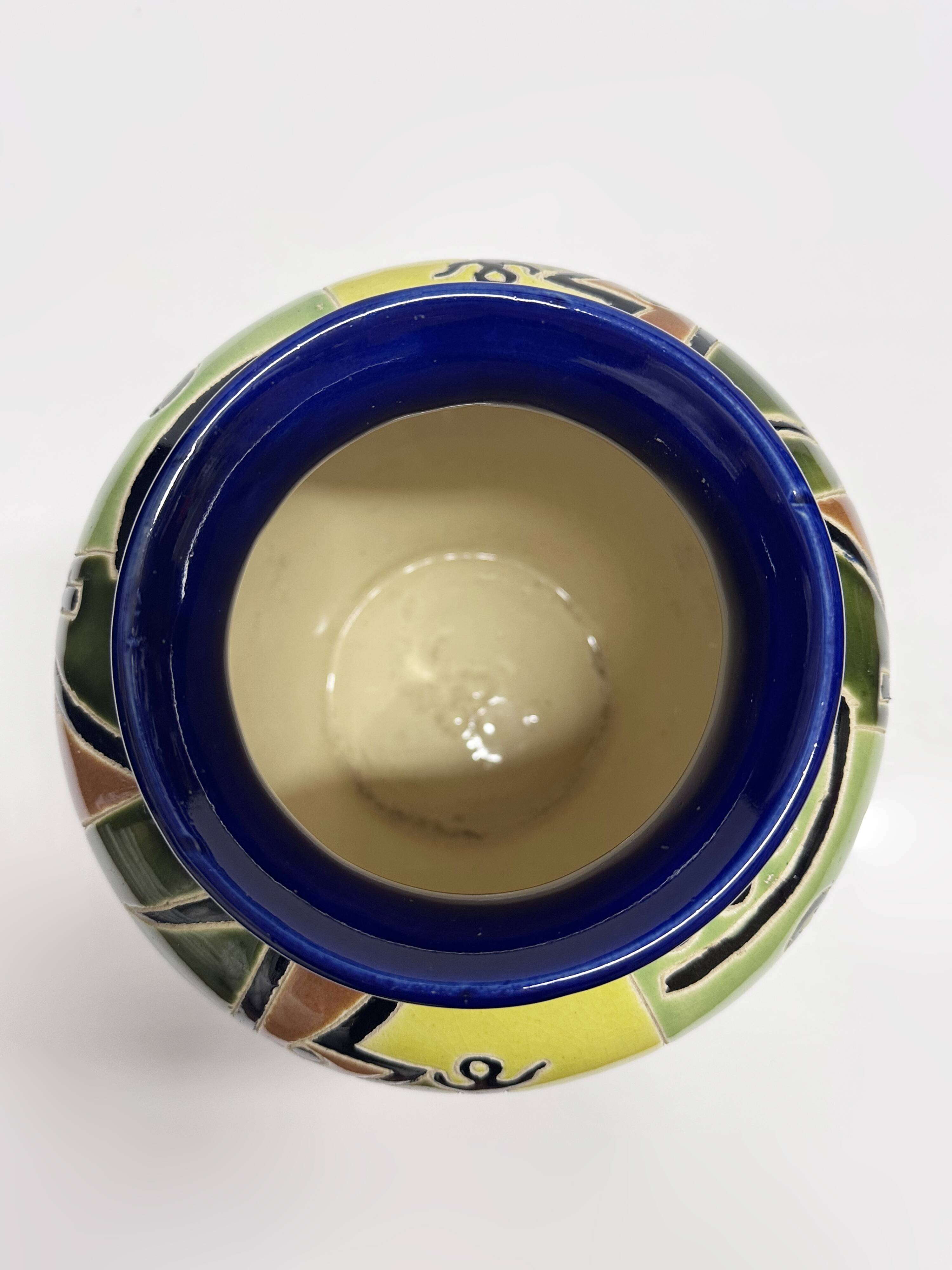 Glazed ceramic vase with Africanist decoration, France 1980s.