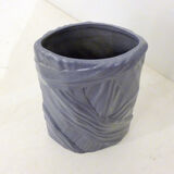 Purple vase, draped ribbons in relief