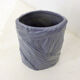Purple vase, draped ribbons in relief