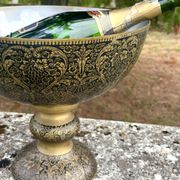 Ornate Floral Pedestal Champagne Cooler, brass ice bucket