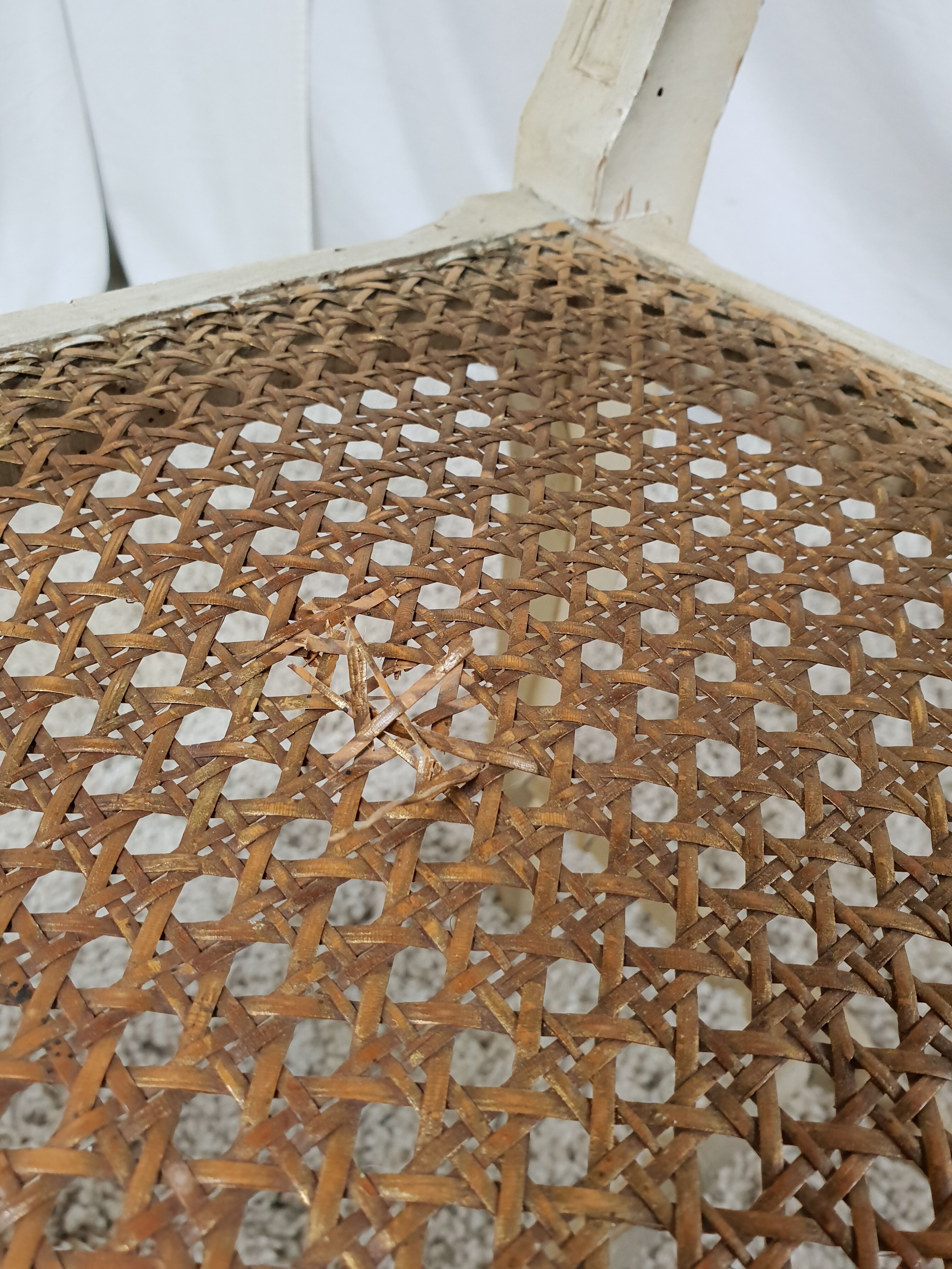 Old caned Louis XV style seat