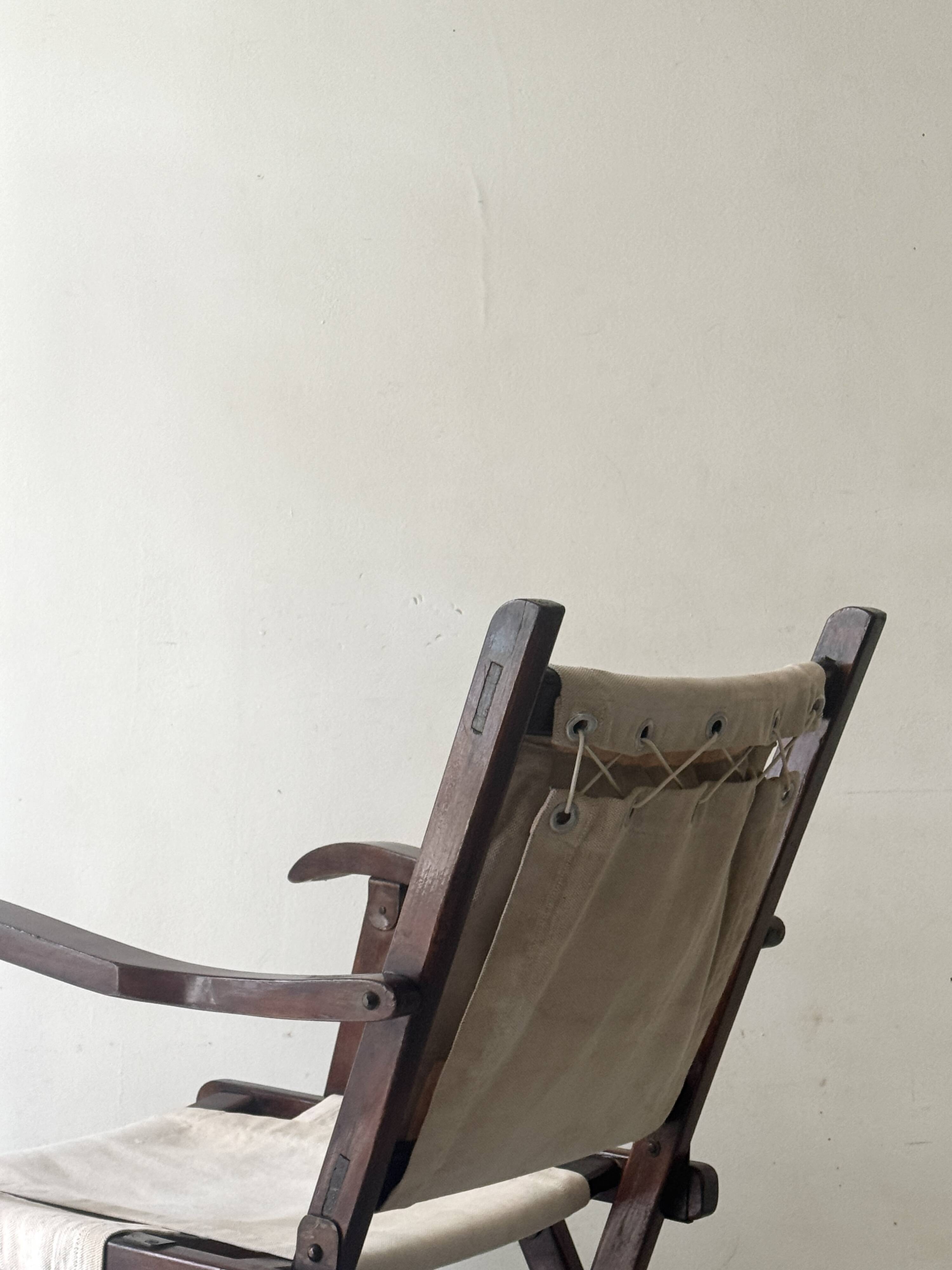 "Safari" folding chair in wood and ecru canvas, 1960s/1970s.