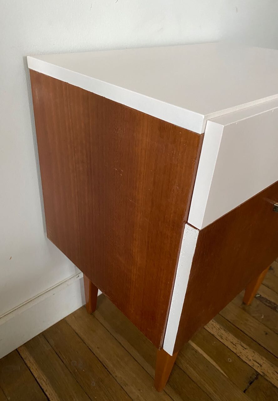 Wooden bedside table and nude