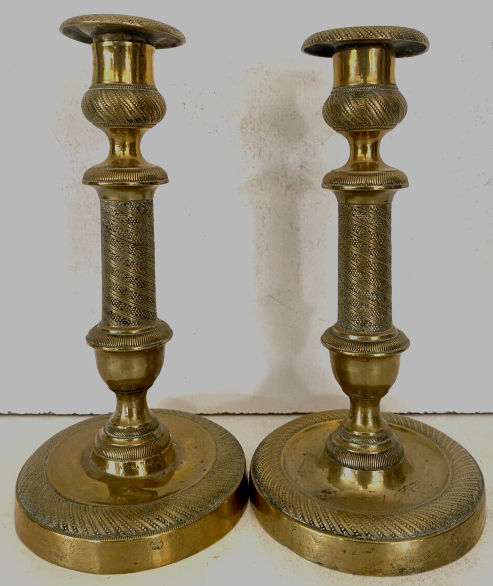 Pair of Louis XVI style candlesticks in chiseled and gilded bronze - XIXth century