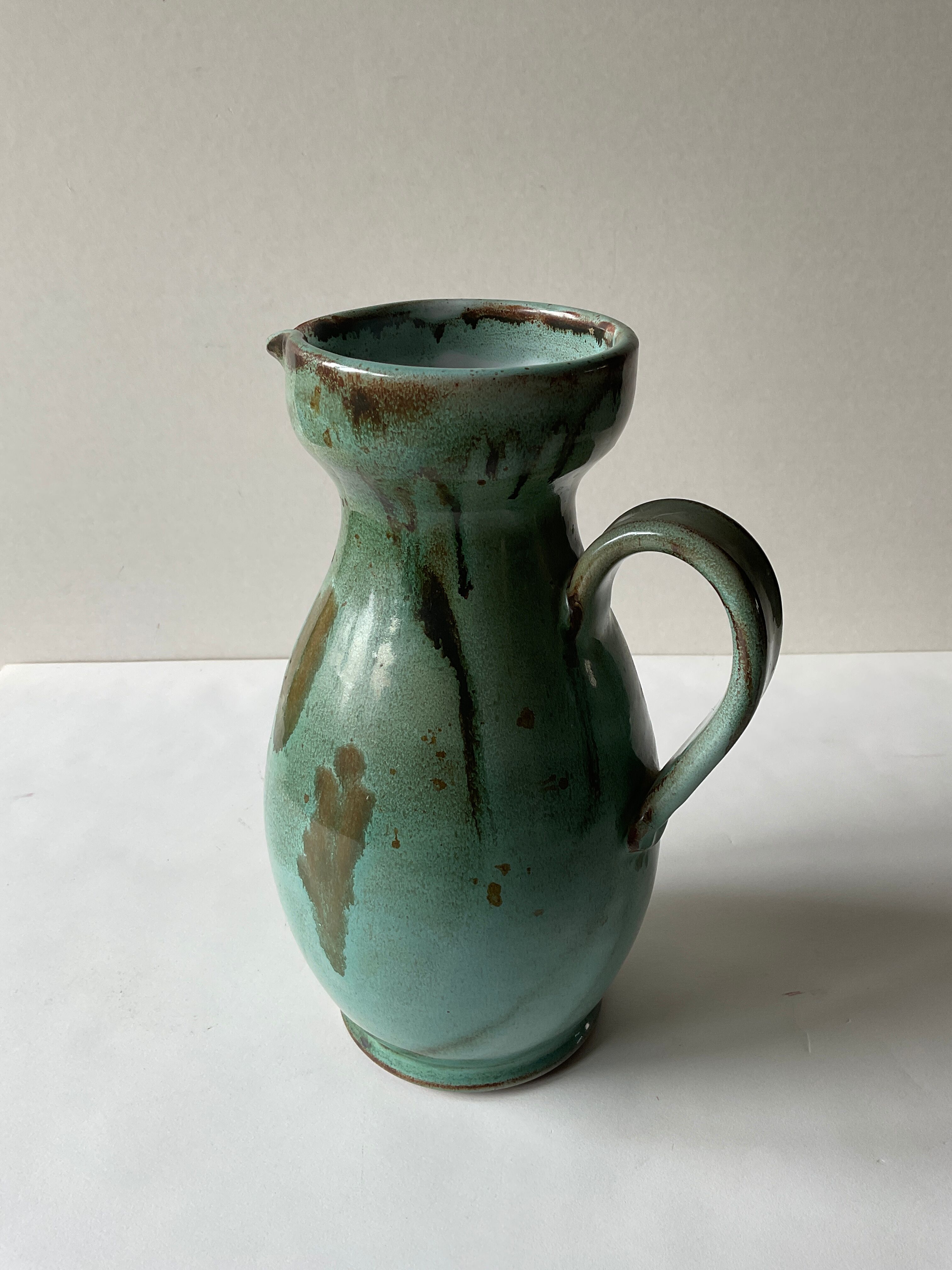 Vintage celadon ceramic pitcher