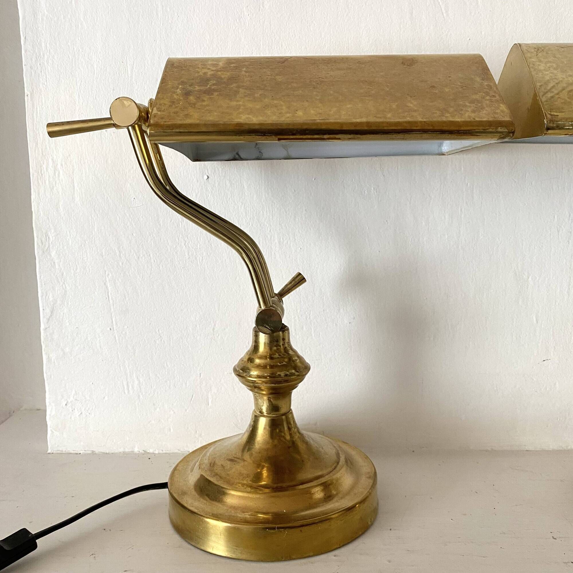 Pair of notary-style lamps in gilded metal