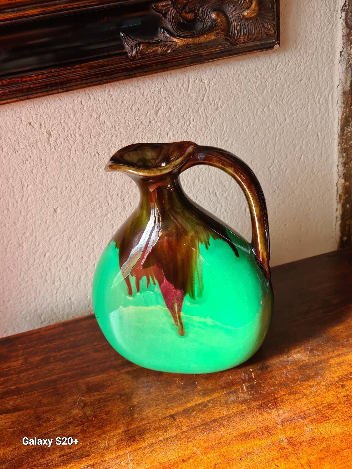 Green and brown ceramic vase