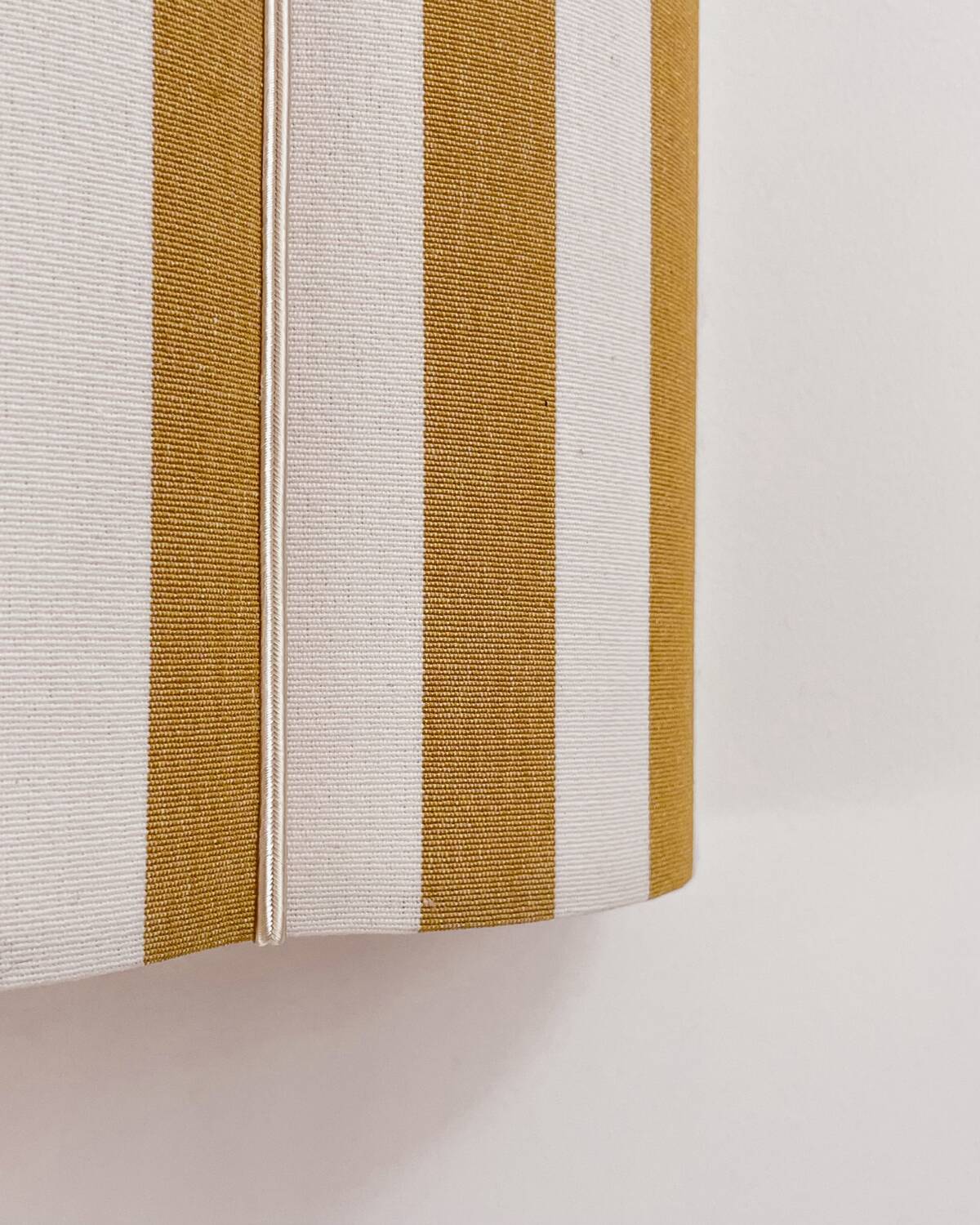 Yellow striped fabric wall light
